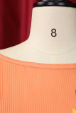 Dos piezas de manga corta con cuello en O y pliegues de patchwork con estampado informal naranja