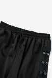 Schwarze Street Solid ausgehöhlte Patchwork-Kreuzträger, lockere, einfarbige Hose mit weitem Bein