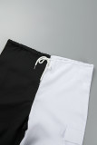 Schwarz-weiße, kontrastierende, lockere, gerade Patchwork-Hose mit mittlerer Taille und Klumpentaschen