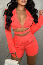 Tangerine Red Sexy Street Solid Patchwork Pocket Turn-back Collar Straight Rompers