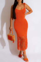 Tangerine Red Casual Solid Tassel Hollowed Out Backless Spaghetti Strap Wrapped Skirt Jurken