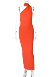 Robe longue sexy orange dos nu à col oblique