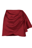 Burgundy Sexy Solid Bandage Patchwork Asymmetrical High Waist Solid Color Bottoms