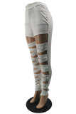 Pantalones casual sólido ahuecado patchwork flaco lápiz de cintura alta color sólido blanco