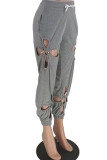 Pantaloni in tinta unita a matita a vita alta regolari in patchwork solido scavato grigio casual da strada