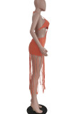 Tangerine Sexy Solid Tassel Hollowed Out Patchwork Backless Swimwears Cover Up