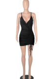 黒のセクシーなソリッドパッチワークフォールド非対称スパゲッティストラップペンシルスカートドレス