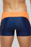 Pantalones cortos con estampado de patchwork a rayas de ropa deportiva azul profundo