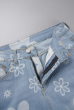 Blaue, lässig bedruckte, zerrissene Jeans mit hoher Taille und normaler Passform