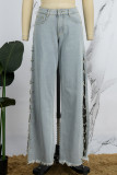 Vaqueros de mezclilla regulares con cintura media ahuecados y retazos informales azul claro (sujeto al objeto real)