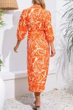 Orangefarbenes, langärmliges Kleid mit lässigem Frenulum-Schlitz und Umlegekragen