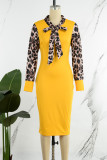 レッドセクシーな英国スタイルのエレガントなヒョウパッチワークプリントOネックラップスカートドレス