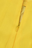 Gelber, eleganter Patchwork-Zweiteiler mit V-Ausschnitt und langen Ärmeln