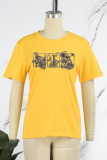 Gele straat vintage print patchwork T-shirts met ronde hals