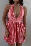 ピンクのセクシーなカジュアルソリッドバックレスホルタープリーツドレス