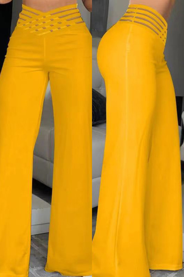 Calças de retalhos lisas casuais amarelas regulares de cintura alta convencionais de cores sólidas