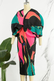 Robes de jupe crayon à col en V et patchwork imprimé rue noire