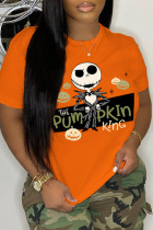 Camisetas básicas com gola redonda laranja casual com estampa de cabeça de caveira