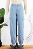 Jeans de mezclilla sueltos de cintura baja con cremallera y botones de bolsillo de patchwork liso casual azul claro