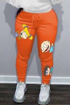Pantalones lápiz de cintura media con patchwork y estampado de personajes casuales rojo mandarina