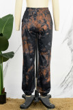 Pantaloni con stampa convenzionale completa a vita alta regolari con stampa tie-dye verde oliva