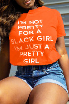 Camisetas casuais laranja com letras patchwork e gola O