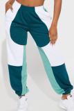 Зеленые повседневные лоскутные брюки с цветными блоками и карманами в стиле пэчворк со средней талией и низкой посадкой
