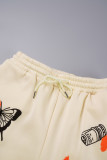 Pantaloni con stampa di posizionamento dritta a vita media patchwork con stampa Street color albicocca