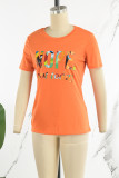 Camisetas con cuello en O de patchwork con estampado de calle casual rojo mandarina