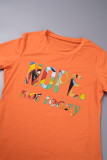 Schwarz-orangefarbene, lässige Street-Print-Patchwork-T-Shirts mit O-Ausschnitt