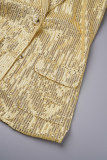 Capispalla con colletto risvoltato patchwork in paillettes color oro di celebrità dorate