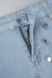 Short en denim bleu clair avec poches en patchwork uni et taille moyenne