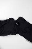 Zwarte sexy effen patchwork doorzichtige rugloze halter mouwloze jurkjurken