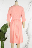 Vestidos plisados ​​con cuello en V plisados ​​con cremallera de retales de vendaje liso elegante rosa