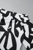 Robe imprimée décontractée noire à imprimé patchwork sur l'épaule Robe grande taille