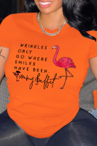 T-shirt con collo a lettera O con stampa vintage arancione