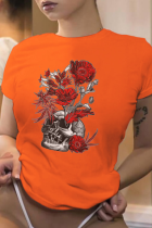 T-shirt con scollo a O con patchwork di teschio con stampa vintage arancione Street