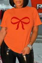 Оранжевые винтажные лоскутные футболки с круглым вырезом и милым принтом