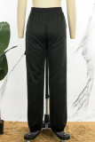 Negro Casual Retazos lisos Regular Media cintura Convencional Color sólido Pantalones