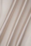 Сексуальное однотонное длинное платье цвета шампанского с разрезом на спине и косым воротником
