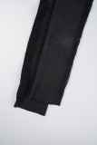 Zwarte sexy casual effen uitgeholde doorzichtige skinny jumpsuits met U-hals