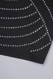 Robes de jupe enveloppées noires sexy en patchwork à pampilles et col en V