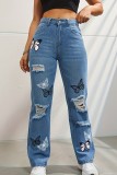 Hellblaue, lässige, zerrissene Jeans mit hoher Taille und Schmetterlingsdruck in normaler Passform