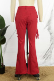 Jeans skinny in denim skinny a vita media strappati con nappa solida casual rossa