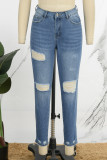 Jeans skinny in denim skinny a vita bassa con bottoni con tasche patchwork strappati solidi blu sexy