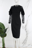 Vestidos de falda envueltos con cuello en O y retazos de encaje liso elegante negro