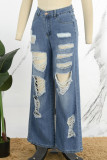 Jeans in denim dritto a vita media con bottoni e tasche patchwork strappati tinta unita blu Street
