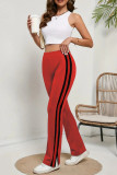 Calças de retalhos convencionais listradas vermelhas casuais de cintura alta regular