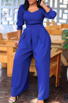 ブルーのエレガントなソリッドパッチワーク非対称襟ルーズジャンプスーツ