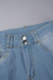 Lichtblauwe casual effen gescheurde patchworkzak met knopen en ritssluiting, skinny denim jeans met middentaille